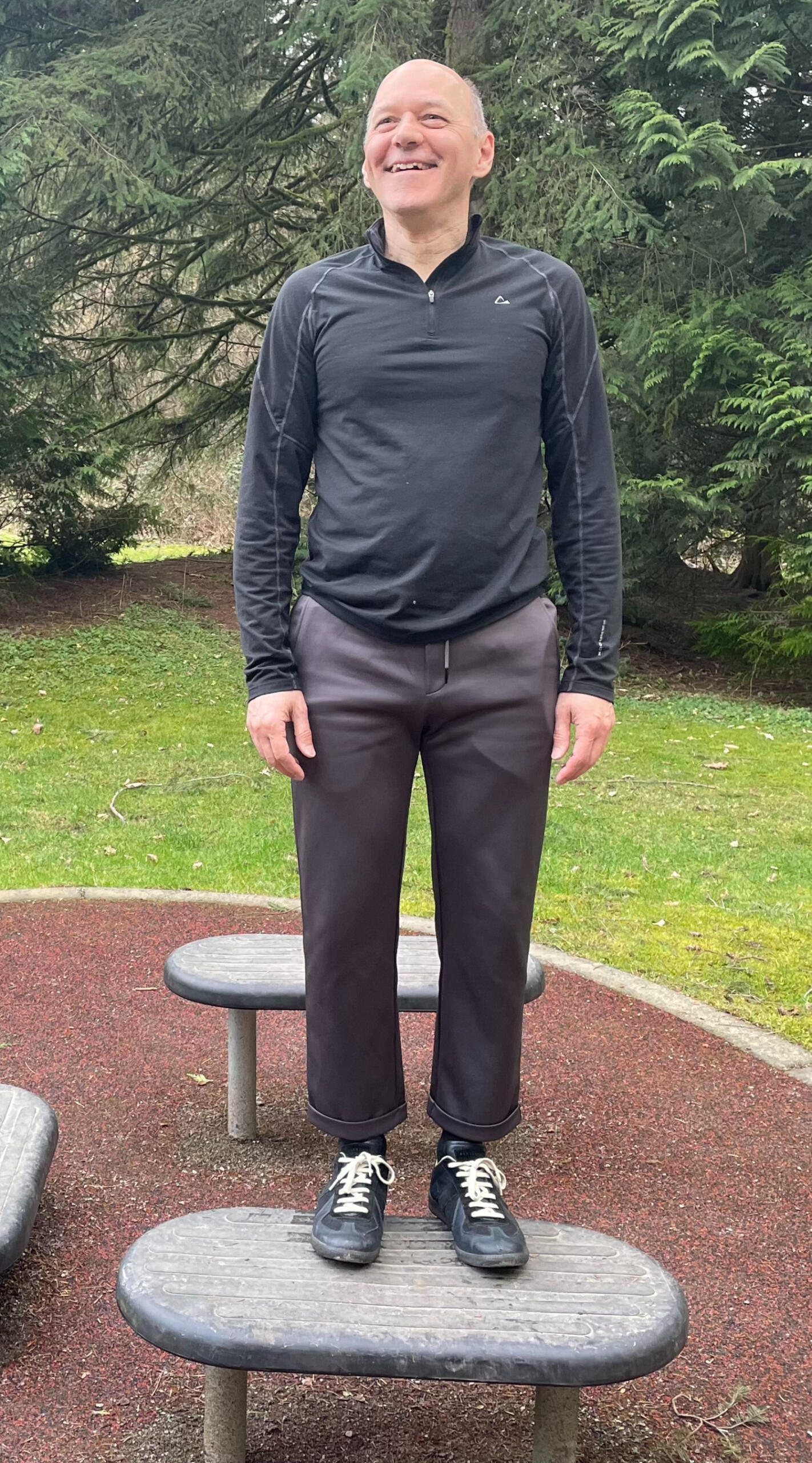 AssureWear pants worn on exercising senior Senior man smiling wearing AssureWears hip protective pants while exercising