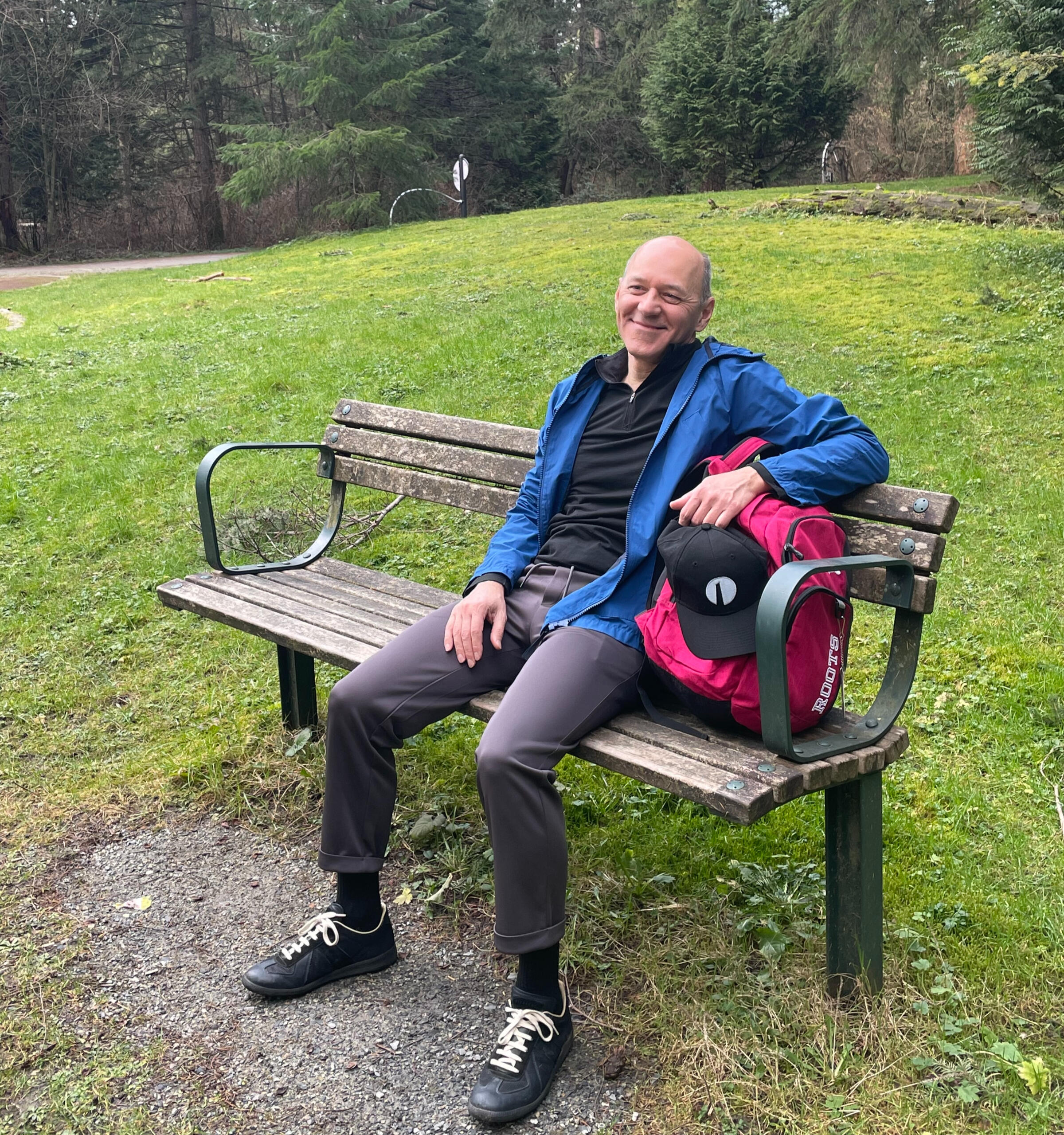 Elderly Man Wearing AssureWear hip protection Pants in Park Man sitting comfortably in AssureWears premium hip protective pants